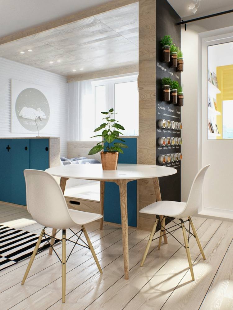 zariadenie 1 izbový byt jedáleň parkety svetlé koberce pruhy čierna a biela