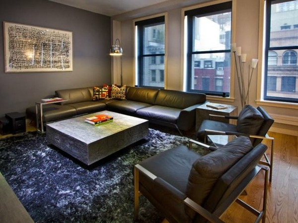 Obývacia izba zariadená čiernym nábytkovým kobercom malý byt zariadený na čierno