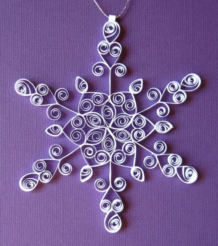 Nápad z papiera - výroba snehových vločiek v zime nápady na zimné dekorácie hviezda snehová vločka nápad špirály drotár