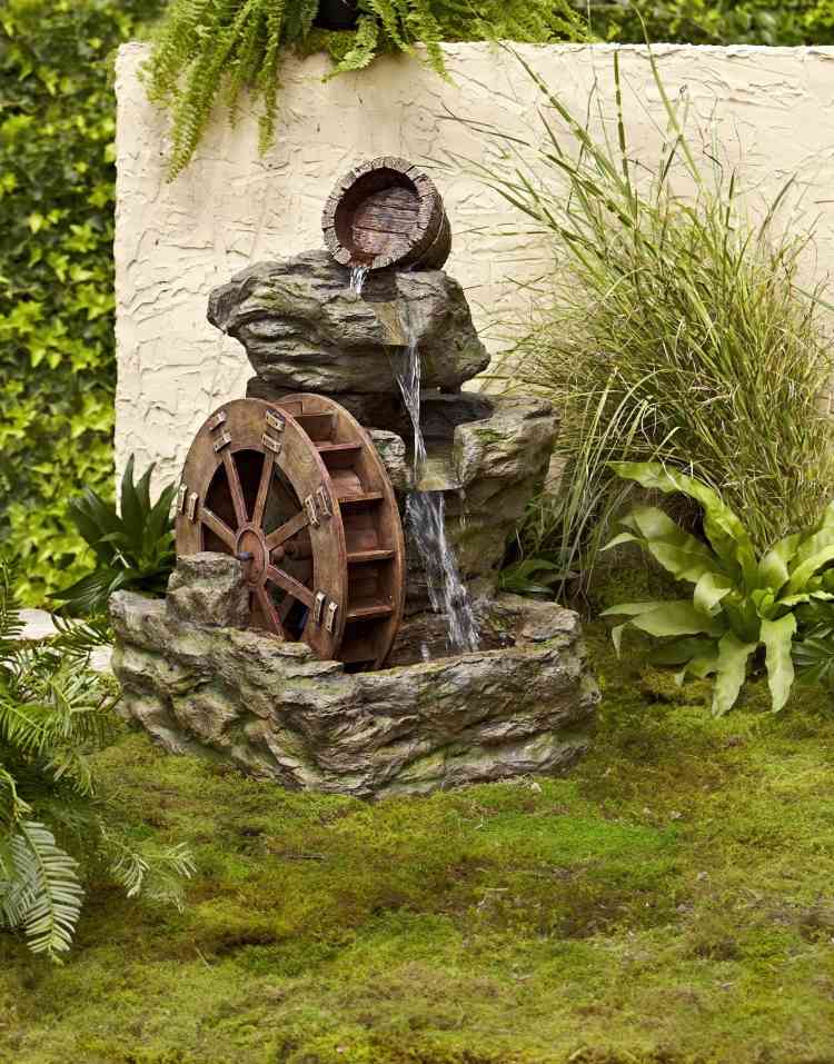 záhradná fontána-nápady-vodný mlyn-malé-dekoratívne-kamene-okrasná tráva