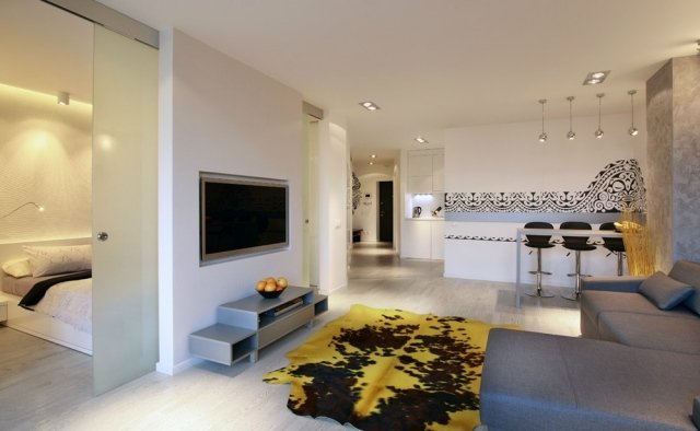 otvorená obývačka obývačka jedálenský pult otvorená kuchynská stena dekorácia maorské motívy otvorené-obývacia izba-jedáleň-bar-otvorená-kuchyňa-stena-dekorácia-maorské motívy