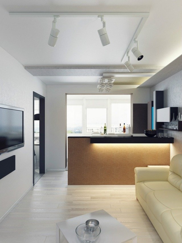 obývacia izba s otvorenou kuchyňou a moderným ukážkovým zariadením obývačka-otvorená-kuchyňa-moderný-príklad-zariadenie