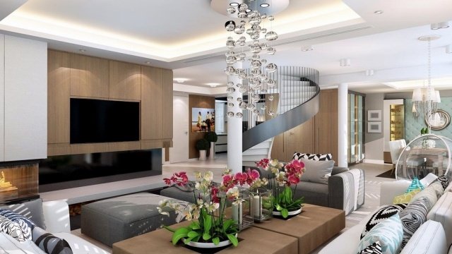 Dizajnová obývacia izba v trendovo-sochárskom vnútornom schodisku-točité schodisko-vstavaný krb dizajn obývačky-drevené obklady-neobvyklé-závesné svetlá