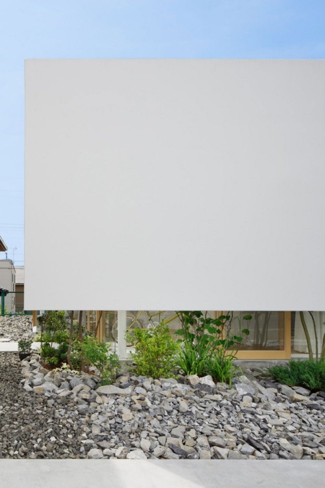 dať kameň na zem zelené rastliny rovné čiary dať kameň na zem vytvoriť zelenú výsadbu formálne