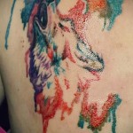 Üvöltő fehér farkas - tetoválás akvarell fotó