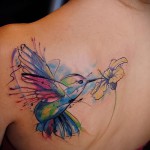 madár virág közelében - tetoválás akvarell fotó