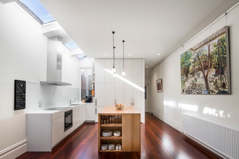 Pracovná doska-kuchynský-ostrov na varenie-nápady-biela-kuchynské fronty