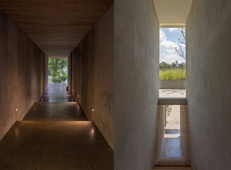 ázijský štýl obývačky chodba dizajn odhalené betónové schody zapustené nástenné svietidlá