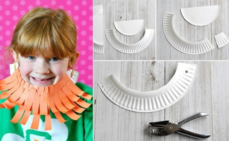 Škriatok na fúzy s oranžovým papierom a papierovou doskou