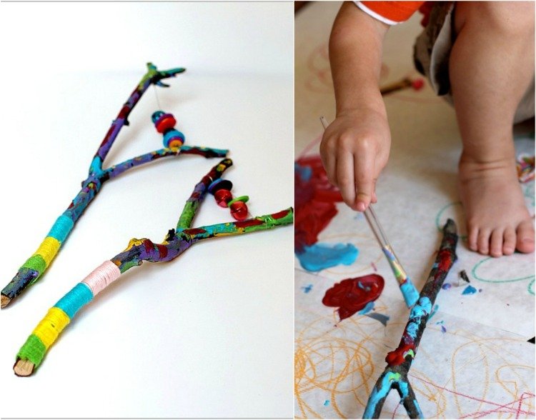 deti vyrábajú ručné práce s tyčinkami, maľujú konáre, korálky