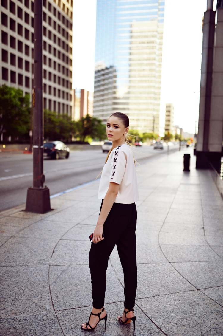 módny trend ostrihané nohavice čierne vysoké podpätky mesto