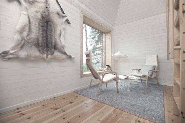stromový dom-hotel-švédsko-červený-dom-interiérový-dizajn-biela-kozia koža