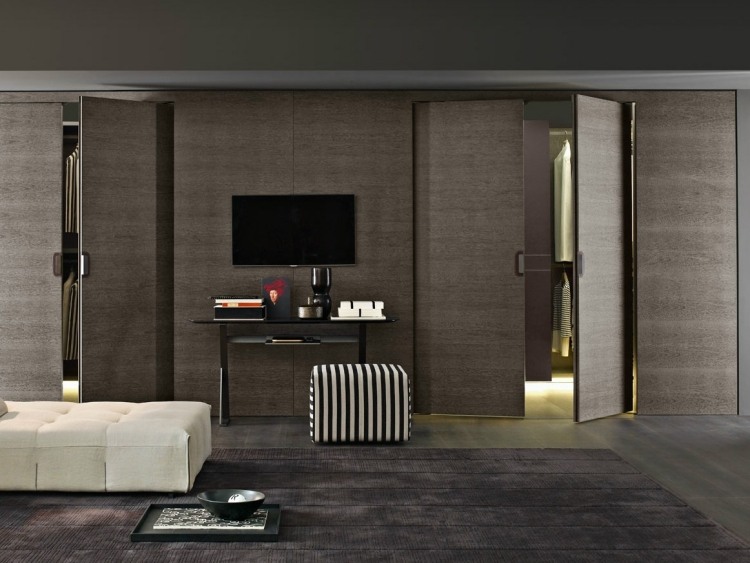 Predné strany skriniek s jemným vzhľadom vyzerajú ako steny v miestnosti šatník-systém-moderný-minimalistický-elegantný-skriňové dvere-antracitovo sivý