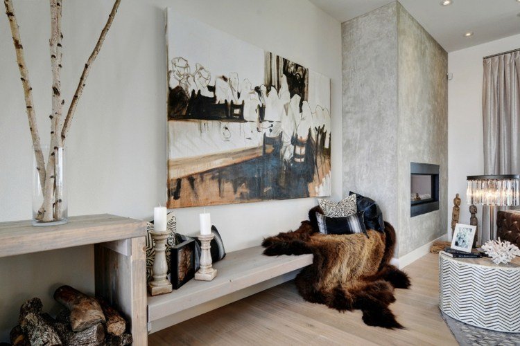 veľké brezové vetvy v sklenenej váze v obývačke Brezová váza sklenená váza obývacia izba v škandinávskom štýle