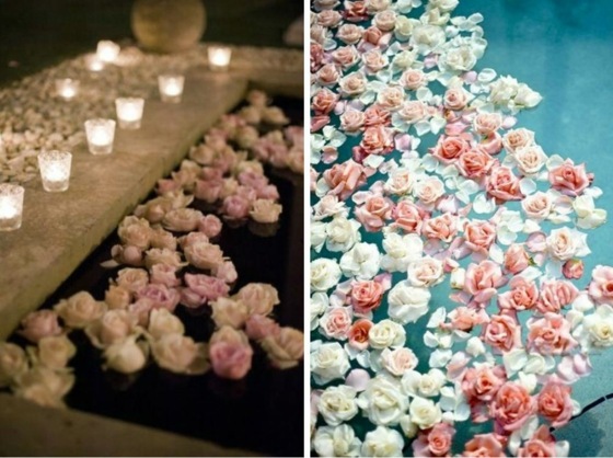 Sviečky v malých sklenených miskách lupene ruží vo svadobnej výzdobe fontány Okvetné lístky ruží-plávajúce vo vode-plavecký bazén