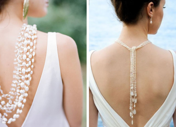 svadobné šaty bez rukávov s dôrazom na zadné perlové náhrdelníky updo