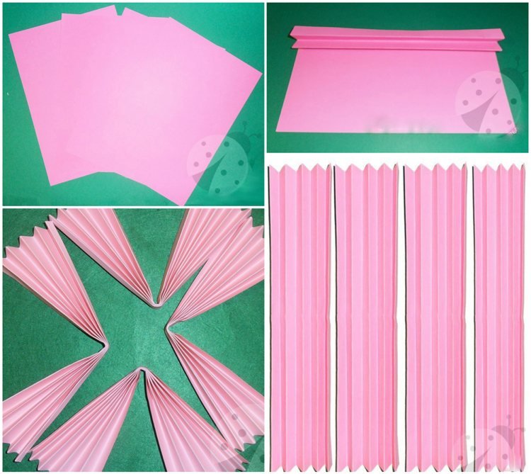 visiaci klaun vyrobí rozety z ružového papiera