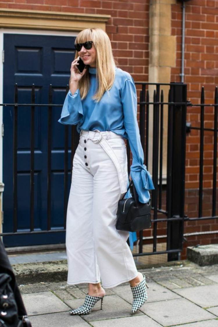 Culottes kombinujú denimovú košeľu na vysokom podpätku s koženou taškou a módnymi trendmi pre blond vlasy