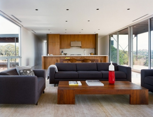 exkluzívny interiér montovaného domu otvorený obývacia izba drevený nábytok