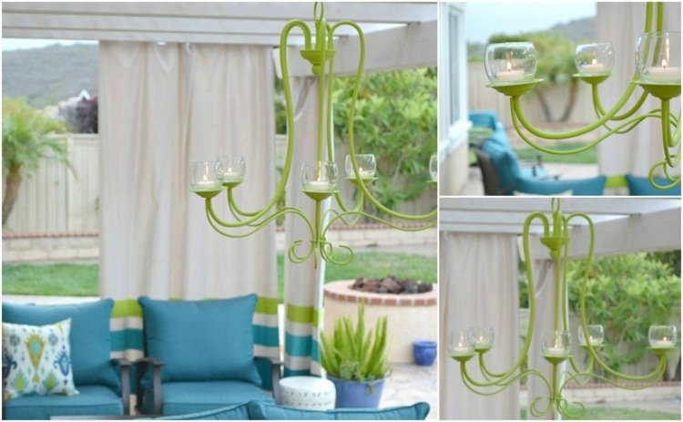 Elegantný zelený luster na čajové sviečky visí na pergole na terase deco-terasa-luster-zelená-držiak na čajovú sviečku-záhrada-leto-jar