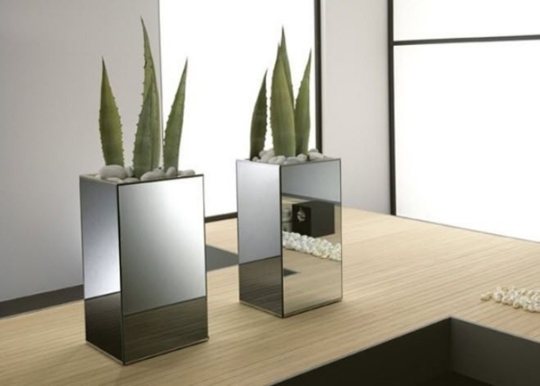 reflexné kvetináče uľahčujú starostlivosť o vnútorné záhrady