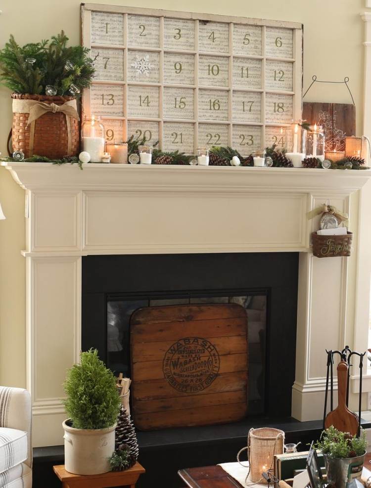 Vytvorte si adventný kalendár a umiestnite ho nad krb vianočné zdobenie-komín-komín-biela-adventný kalendár-sviečky-čajové sviečky-lampáše-šišky
