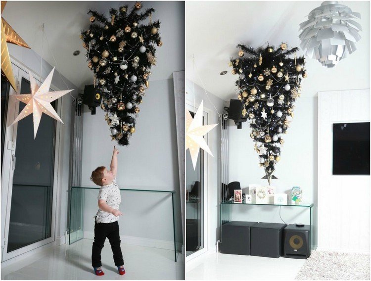 Vianočný stromček visí hore nohami deka deti