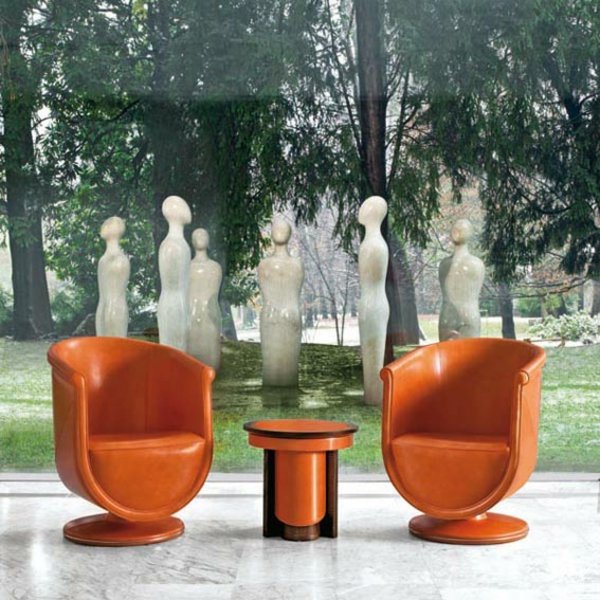 obývacia izba z oranžových kožených stoličiek obývacia izba z kožených stoličiek oranžovej farby