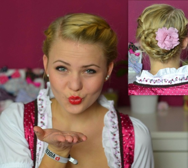 ružové kvety bočný lúčiaci sa slimák z vrkoča späť pripnuté účesy na Oktoberfest