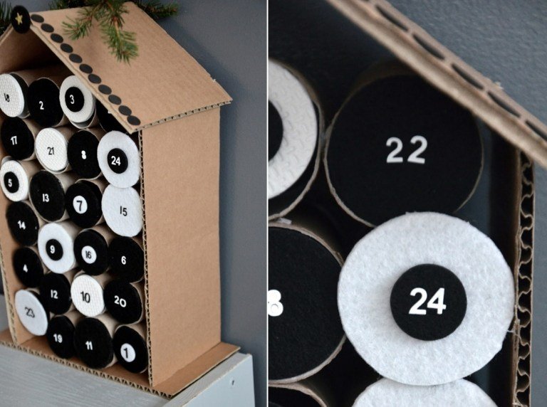 Minimalistická myšlienka adventného kalendára v čiernej a bielej farbe a vyrobená z lepenky