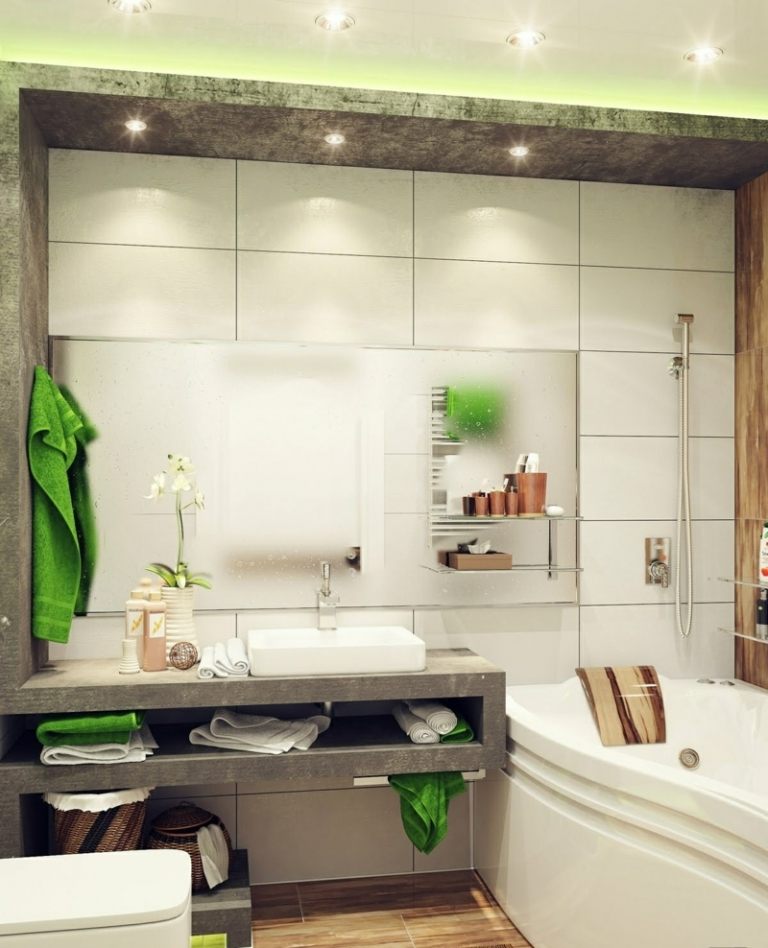 kúpeľňa malý betónový vzhľad biele dlaždice zelené detaily deco