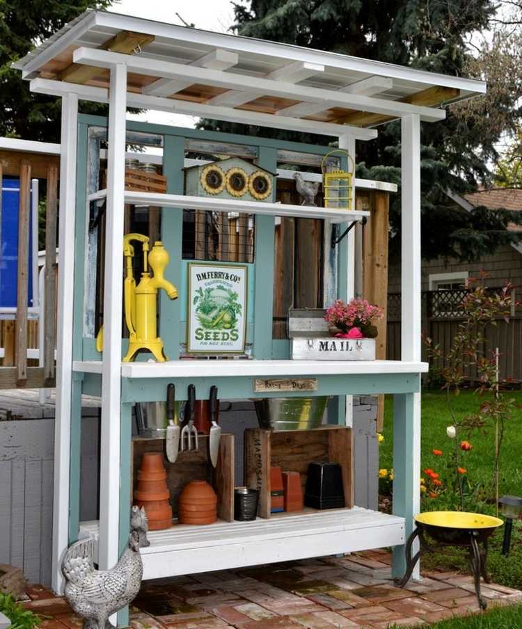 Nápad na rastlinný stôl s baldachýnom ako ochrana pred slnkom sadiaci stôl pre záhradnú strechu nápad stolička kvetináče nástroj