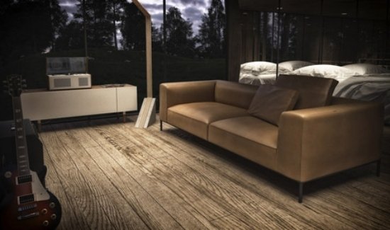 kožená sedačka hnedá jedna izba dizajnér sklenený dom svah kožená sedacia súprava hnedá jednoizbový dizajnérsky sklenený dom na svahu