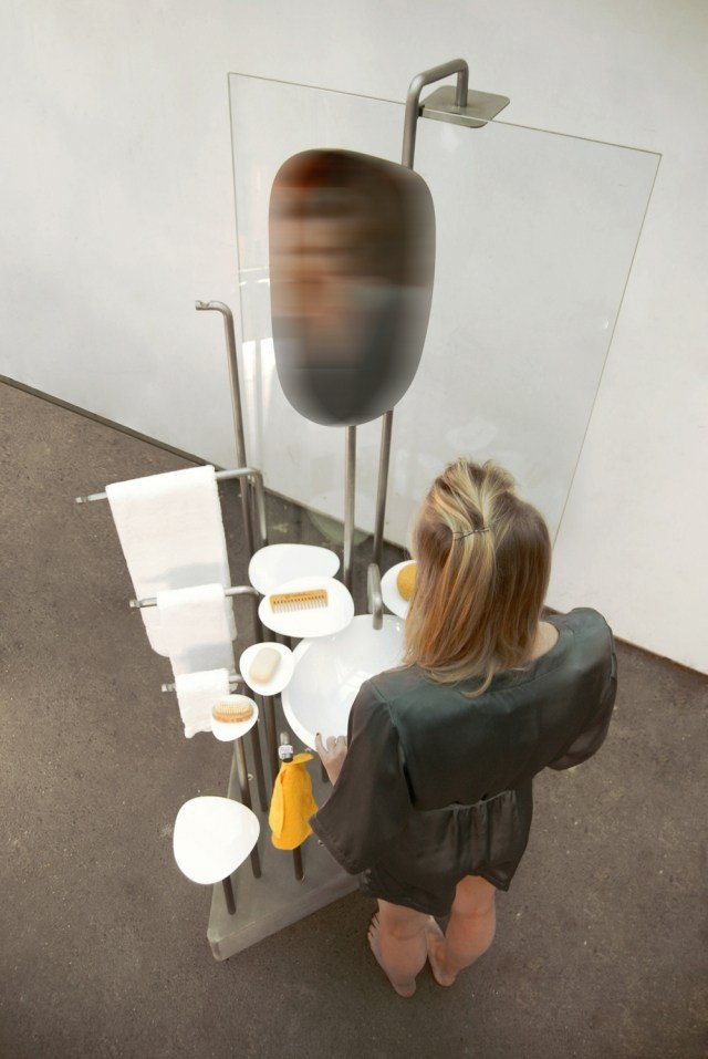 priestorovo úsporná kúpeľňová jednotka alegorického štúdia s okrúhlym dizajnom