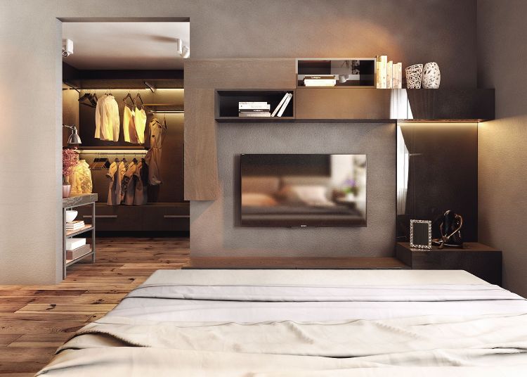 Pohľad z postele v elegantne zariadenej spálni nápady na zariadenie-neutrálne-farby-spálňa-hnedá-polica-vysoký-lesk-matná-stena-televízia-drevená podlaha