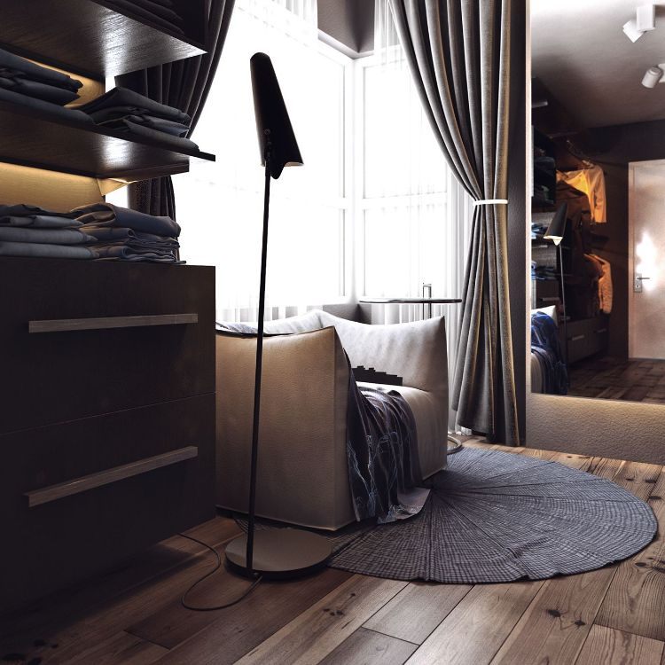 Toto kreslo je dobrým miestom na čítanie nápady na zariadenie-neutrálne-farby-šatník-béžová-relax-kreslo-stojacia lampa-hnedá-policová-skriňa-okrúhly koberec