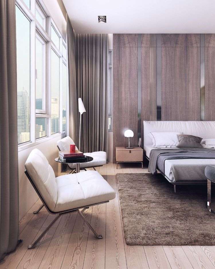 Zrkadlá dodávajú miestnosti ilúziu väčšieho priestoru. nápady na zariadenie-neutrálne farby-spálňa-čalúnená posteľ-béžová-kreslo-obloženie-steny-drevo-zrkadlo-pruhy