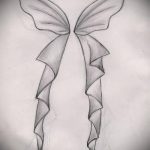 Az íj tetoválás vázlata # 519 a minta érdekes változata, amely jól használható az íjak feldolgozására és felhelyezésére a combokra tetoválásként