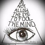 vázlat egy szem tetoválásáról egy háromszögben