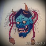 Ciekawy szkic do tatuażu z maską - rysunek do stworzenia unikalnego tatuażu z maską
