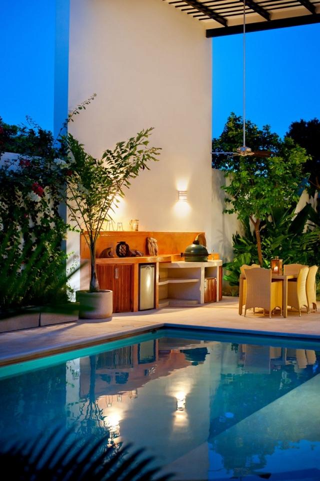 Závesné svetlá a nástenné svetlá navodia atmosféru pri bazéne Casa-CP78-Krytá terasa, dvojité vysoké, moderné, vonkajší nábytok, exotické