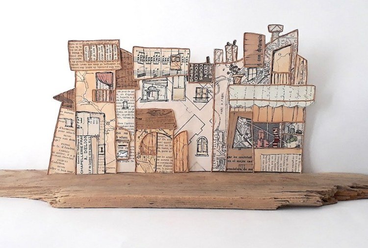 Drotár s papierovým drôtom a novinami pre zaujímavú panorámu