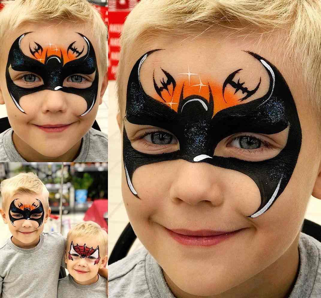 Batman doplní farbu masky dieťaťa pre netopiera