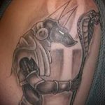 Az anubis tetoválás egyedülálló példája - a rajz alkalmas anubis tetoválásra a lábán