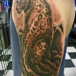 fotó a leopárd tetoválásról # 179 - a minta egyedülálló változata, amely sikeresen használható változtatásra és leopárdtetoválásként a lábára