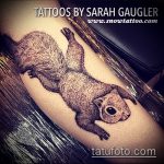 A mókus tetoválásának hűvös változata - a rajz alkalmas a mókus és a nyíl tetoválásának fényképére