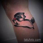 Érdekes példa egy kész mókus tetoválásra - a rajz alkalmas a lábán lévő mókus tetoválására