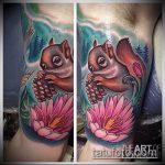 Egy meglévő mókus tetoválás egyedi változata - a rajz alkalmas egy mókus és nyíl tetoválás fényképéhez