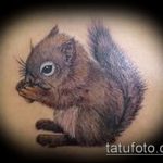 A kész mókus tetoválás érdekes változata - a rajz alkalmas a tetováló mókus taxiban való fényképezésére