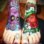 fotó a 34. számú katicabogár tetoválásról - a minta exkluzív változata, amely könnyen használható változtatásra és katicabogár tetoválására az ujján